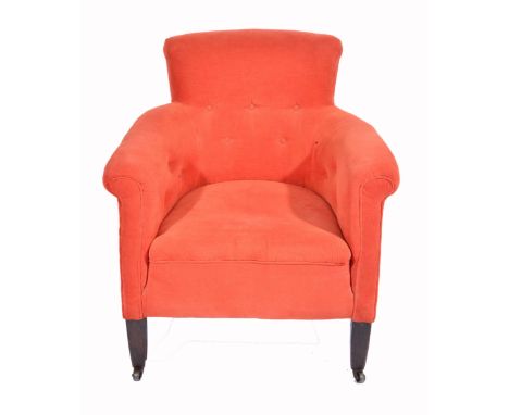 AN EDWARDIAN BUTTON BACK UPHOLSTERED TUB CHAIR