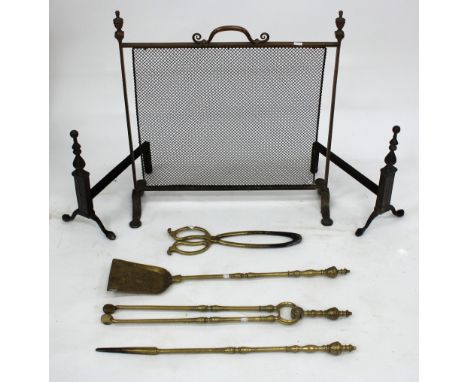 A SET OF THREE GEORGIAN STYLE BRASS FIRE IRONS with urn finials together with a pair of tongs, a pair of fire dogs and a bras