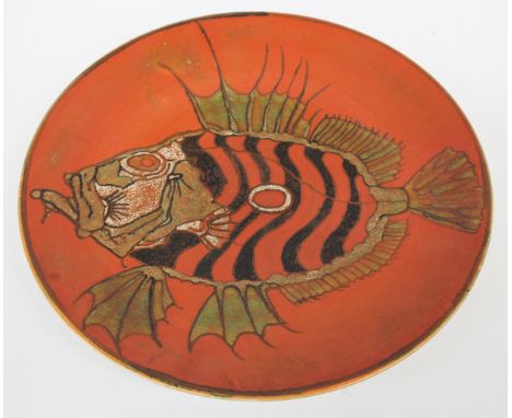 A POOLE POTTERY ORANGE GROUND CHARGER decorated with a rockfish with stamped mark to the reverse, 34cm diameter