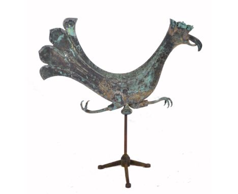 AN EARLY 19TH CENTURY TIN WEATHER VANE in the form of a running cockerel and mounted on later stand 104cm long, beak to tail 