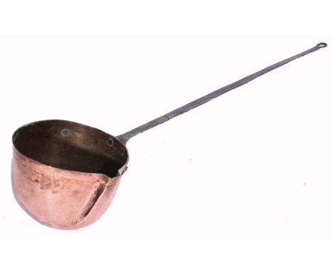 A 19TH CENTURY LARGE COPPER LADLE with iron handle, 106cm long overall