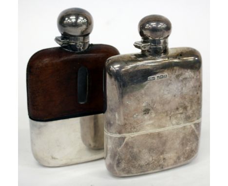 AN EDWARDIAN SILVER HIP FLASK and fitted cup with hinged screw on lid, marks for Sheffield 1904, makers mark of James Dixon &