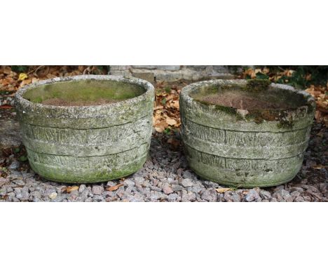 A PAIR OF CYLINDRICAL GARDEN PLANTERS, 43cm diameter and a square planter (3)