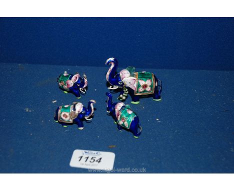 Four early 20th c. Indian enamel, silver and seed pearl Elephant gaming pieces, Jaipur or Benares.