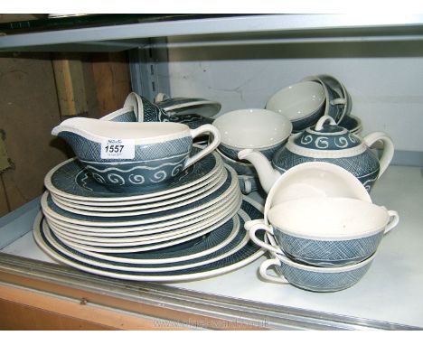 A part Portland Pottery, Regal Works, Cobridge, Dinner/Tea service decorated in blue and white swirl pattern including three 