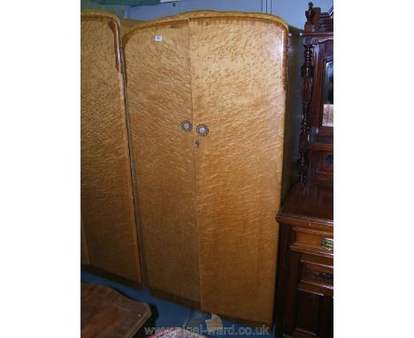 A 1960's bird's eye Maple finished double door fitted Wardrobe by Durable Suites Ltd., having pair of doors with cross-banded