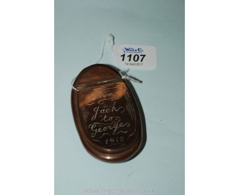 A curved Copper Snuff Box engraved "from Jack to George 1916"