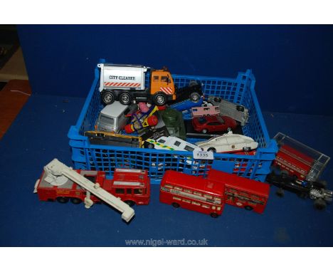 A quantity of Corgi, Matchbox and Scalextric cars including Daimler double-decker bus, John Player Special, K-39 Shorkel Fire