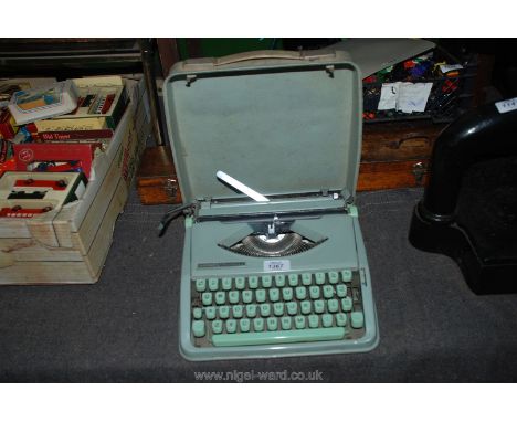 A 1960's Hermes portable Typewriter