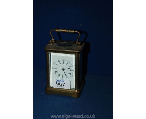 A Brass Carriage Clock with Roman numerals