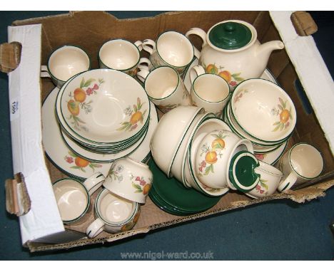 A peaches and cream pattern part Dinner and Tea Service including tea plates, dinner plates, cereal bowls, cups and saucers, 