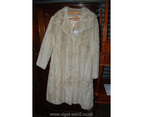 A Ladies vintage faux fur pale cream colour Coat by "Allander" size medium, calf length