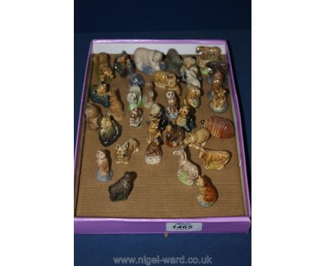 A quantity of Wade Whimsies including dogs, otter, monkey, koala etc.