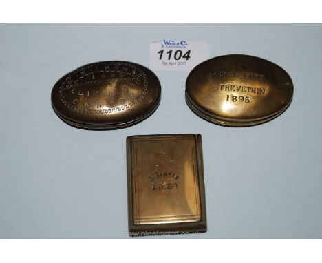A rectangular Brass Snuff Box inscribed "J Lewis 1880",  (will not open), an oval Brass Snuff/Tobacco Box engraved "Peter Pit