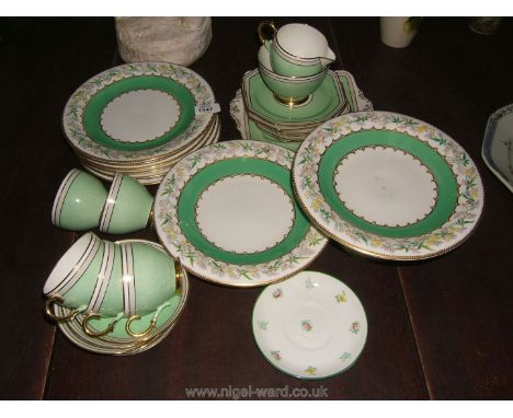 An old Paragon part tea service and an antique part dessert service decorated flowers.