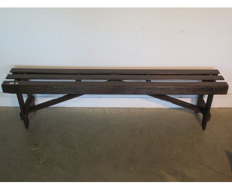 A vintage dark pine polished bench - 44cm x 171cm -in clean waxed condition 
