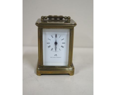 A Matthew Norman miniature carriage clock, approx 6cm H, 4.5cm W, 3.5cm D, without key, not currently running 