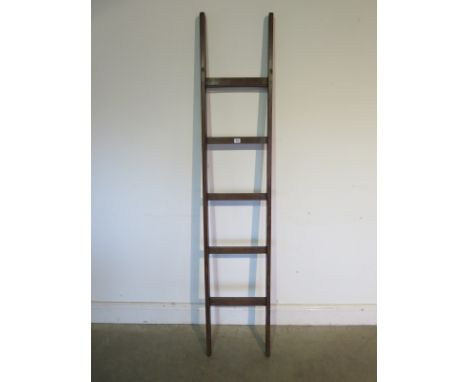 A five tread wooden ladder, waxed for decorative purposes  - 182cm H 