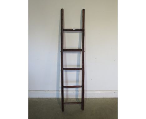 A rustic dark wood five rung ladder - polished for decorative use - 154cm H 