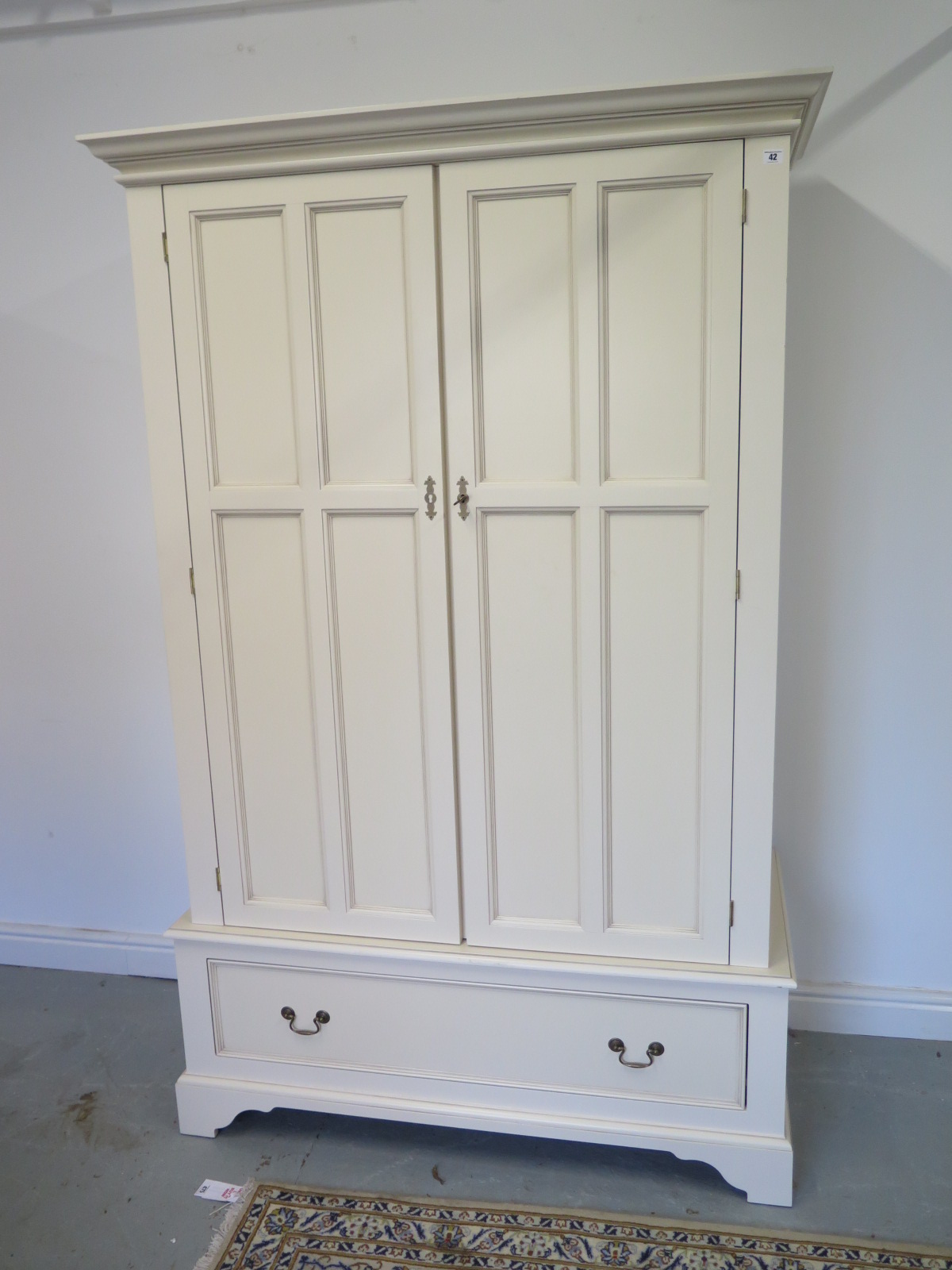 A modern Laura Ashley wardrobe with a base drawer 1520cm W x 200cm H