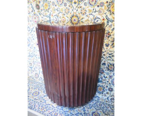 A Ralph Lauren Penthouse Suite fluted commode in mahogany with two fluted doors, ex display and in good condition - 103cm H x