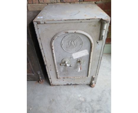 A vintage J Cartwright and Sons safe with key approx 66cm x 46xm x 47cm - with wear throughout but structurally sound 