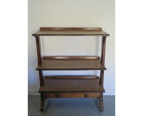 A Victorian Gothic revival three tier buffet with a base drawer - 130cm H 102cm x 45cm 