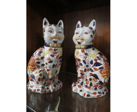 A pair of large modern reproduction ceramic imari cats 
