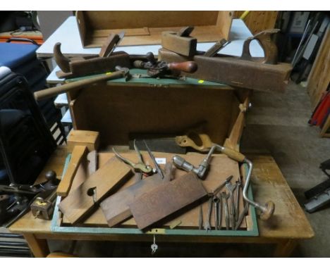 A vintage carpenters oak wooden tool box and contents to include Stanley planes 