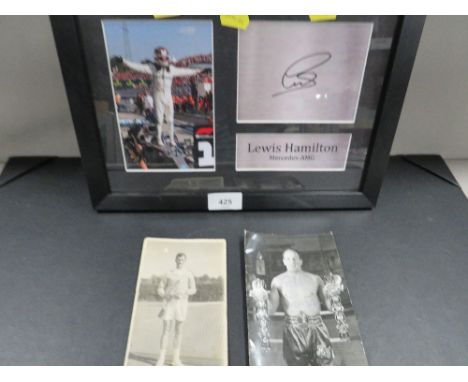 Lewis Hamilton 'FACSIMILE' autograph, framed with photograph, a signed photograph of boxer Henry Cooper and a signed photogra