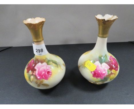 A pair of Royal Worcester small specimen vases both A/F 