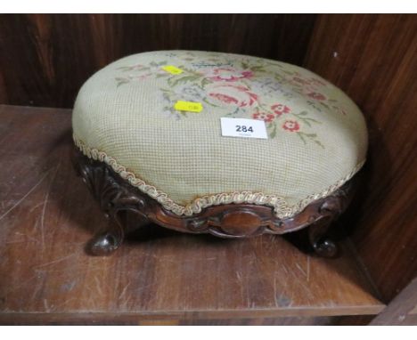 A vintage tapestry footstool 