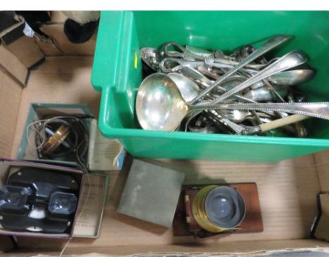 A tray of collectables to include camera lens, tub of assorted silver plated flatware etc