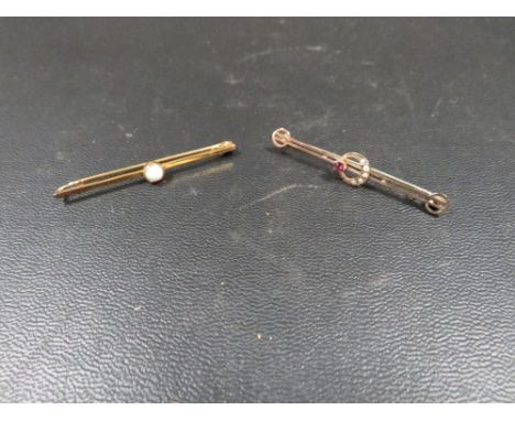 A 9ct bar brooch with seed pearl crescent with pink stone together with an unmarked example set with an opal (2) 