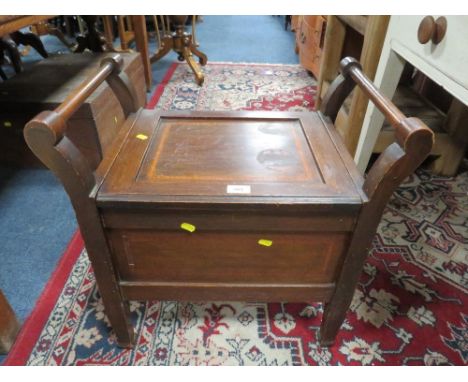 A antique mahogany inlaid piano stool 