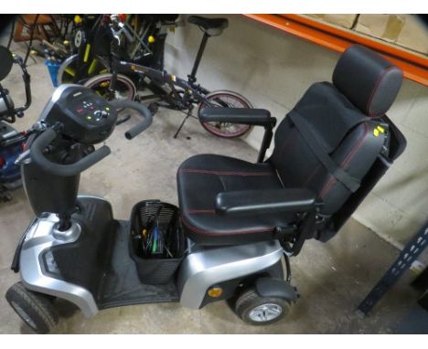 A Kymko mobility scooter - no key - charger present - untested 