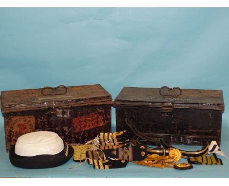 Two fitted tin naval hat boxes by Gieves, a sword belt, seven pairs of Royal Navy Captain, Commander and Lieutenant epaulette