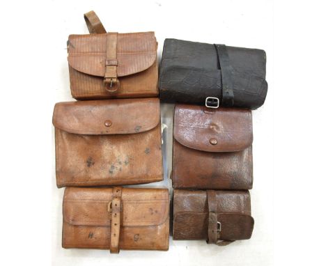 Six leather fly wallets by W J Cummins, C Farlow &amp; Co. Ltd, Army and Navy CSL and others. 