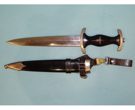 Klittermann &amp; Moog G.m.b.H, a German SS Nazi dagger with ebonised grip with metal eagle, swastika and SS device, the blad