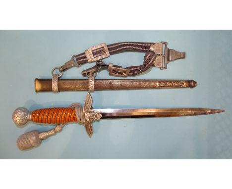 Stocker &amp; Co, a WWII German Luftwaffe 2nd pattern dress dagger with orange celluloid grip, having wire binding, cross gua