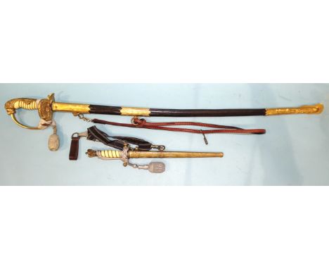 A WWII German Kriegsmarine officer's dress sword by E &amp; F Horster, Solingen, with white celluloid grip, lion's head pomme