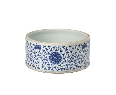 A BLUE AND WHITE PORCELAIN PLANTER OR POT
Decorated with stylised flowers and lotus, the rim likely to have fitted another se
