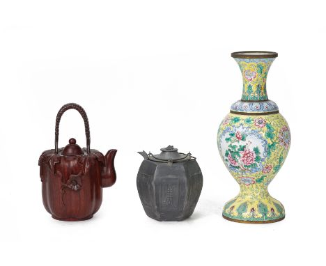 A GROUP OF CHINESE WORKS OF ART
Comprising an 20th century enamel baluster vase, a hexagonal pewter teapot and a carved rosew