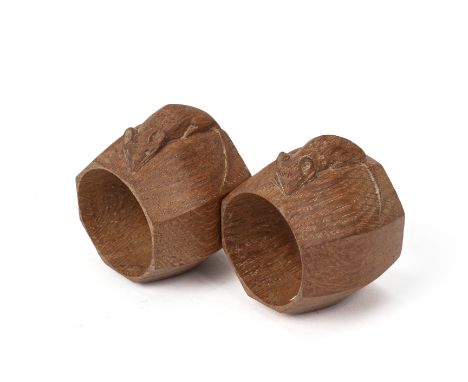 A PAIR OF ROBERT 'MOUSEMAN' THOMPSON WORKSHOPS NAPKIN RINGS
Carved oak octagonal napkin rings with mouse signature to exterio