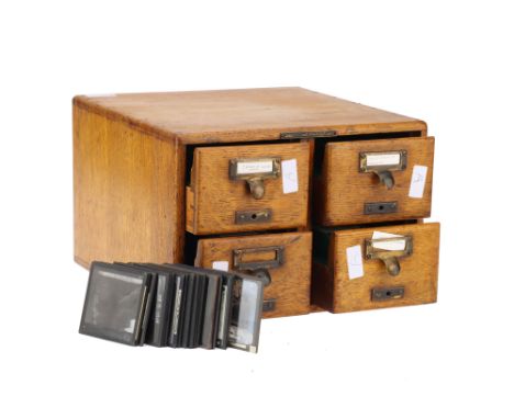 Oak Cabinet of Magic Lantern Slides a polished oak 4 drawer magic slide cabinet with slides, subjects include Japan, UK archi