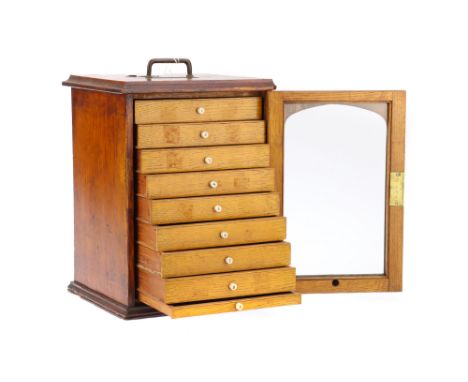 Microscope Slide Cabinet, English, c.1860, unsigned, constructed of French polished mahogany with 9 light oak drawers each ca