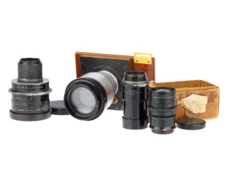 Collection of Large Format Camera Lenses, comprising of a large 14in f5.6 Anastigmat in an aluminum conical mount on a lens b