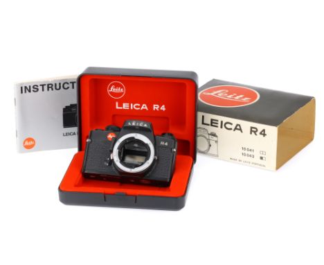 A Leitz Portugal Leica R4 35mm SLR Body black, 1981, serial no. 1562032, body G, shutter untested, with instruction manual, p