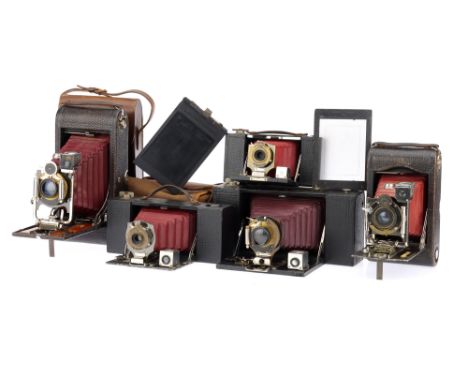 A Selection of Red Bellows Kodak Folding Cameras comprising a No.3-A Folding Brownie camera with a Bausch &amp; Lomb Rapid Re