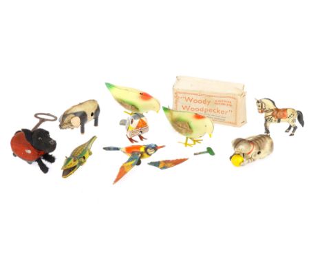 Collection of Tin Plate Toy Animals, comprising of a boxed Woody Woodpecker with key, another similar with no box, a tinplate